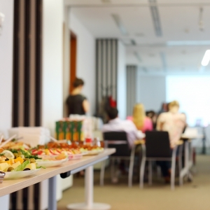 Lunch laid out with a presentation ongoing behind